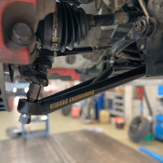 Wiborg Engineering Circuit Geometry kit installed on a GR Yaris, underbody view of front LCA Arm