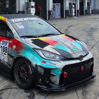 Andre KRUTROK Time Attack Toyota GR Yaris RALLY 1 - WRC style HOOD VENTS Kit PIRAS Motorsport, front right view in Paddock