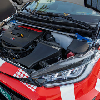 GR Yaris engine bay with open hood, shows PIRAS Motorsport Airbox installed, from top left side