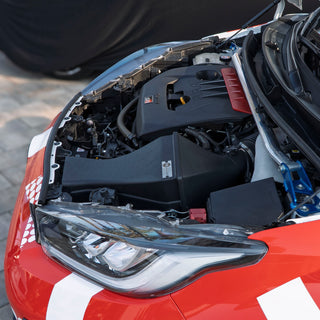 GR Yaris engine bay with open hood, shows PIRAS Motorsport Airbox installed, left view